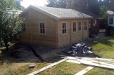 Blockbohlenhaus SCOOT (44 mm) 27 m² mit 10 m² Schlafboden customer 3