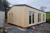 Mobilheim aus Holz ANGELA M (Isoliert, 44 mm + Holzverschalung), 8.2x6.2m, 50 m² customer 2