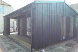 Blockbohlenhaus ANNA Modern (34 mm + Holzverschalung), 37 m² customer 3