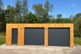Doppelgarage aus Holz mit Flachdach SILVIA DUO F (34 mm + Holzverschalung), 6x6 m, 36 m² customer 1